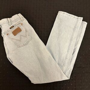 Distressed light wash wranglers